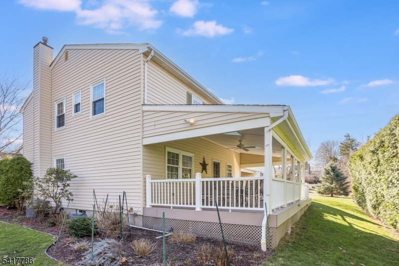 10 Torlish Gate Raritan, NJ 08869 - Photo 33 of 40 a front view of a house with a garden