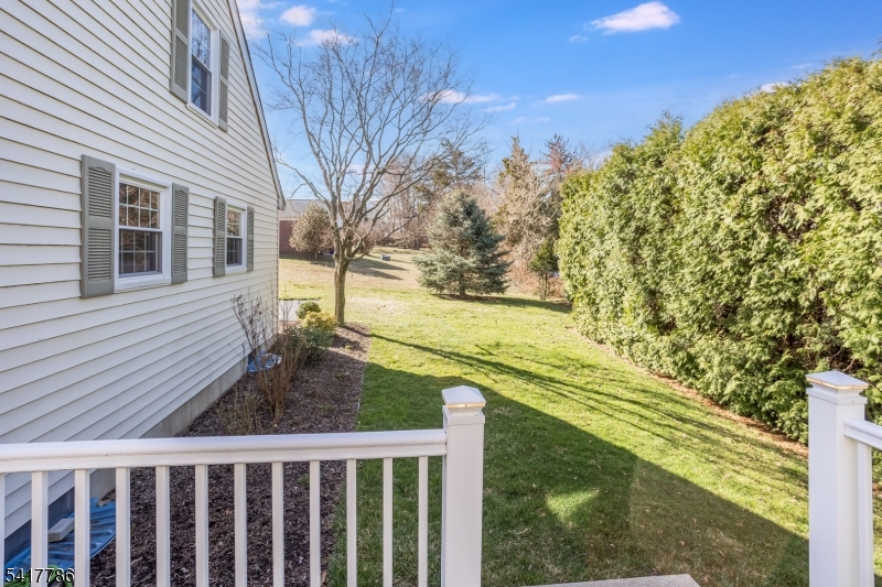10 Torlish Gate Raritan, NJ 08869 - Photo 35 of 40 a view of a yard with wooden fence