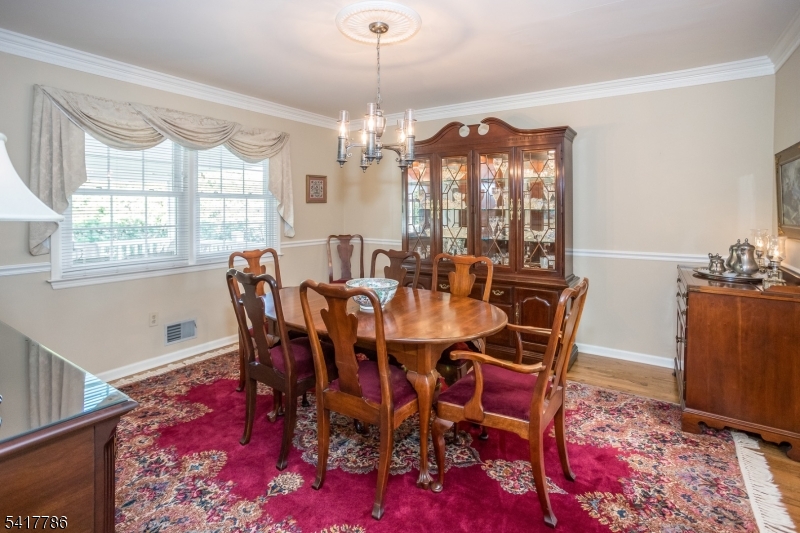 10 Torlish Gate Raritan, NJ 08869 - Photo 10 of 40 a view of a dining room with furniture window and wooden floor