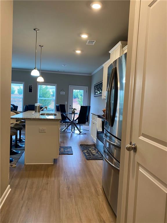 5149 Fox Den Road Oakwood, GA 30566 - Photo 14 of 44 a view of a kitchen and dining room