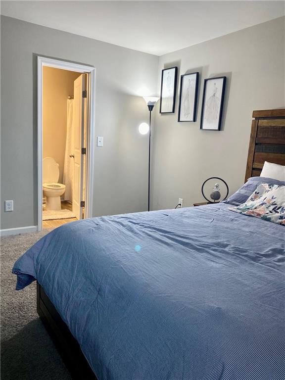 5149 Fox Den Road Oakwood, GA 30566 - Photo 21 of 44 a bedroom with a bed and a window