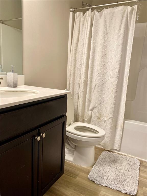 5149 Fox Den Road Oakwood, GA 30566 - Photo 22 of 44 a bathroom with a sink and a toilet