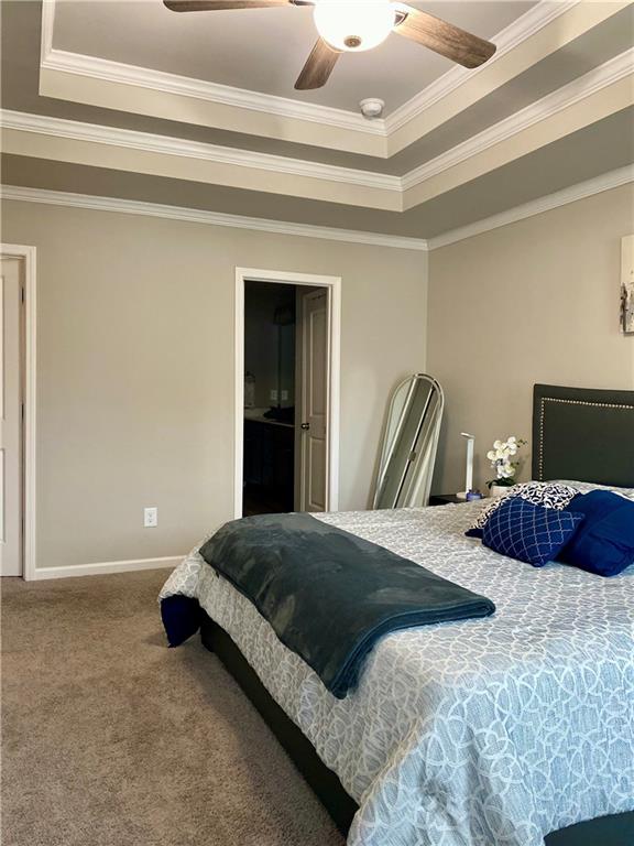 5149 Fox Den Road Oakwood, GA 30566 - Photo 27 of 44 a bedroom with a bed and a night stand