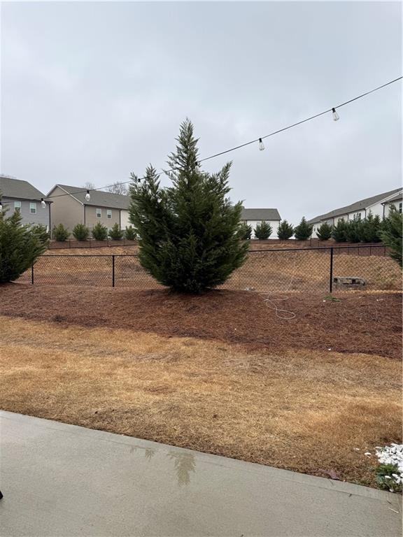 5149 Fox Den Road Oakwood, GA 30566 - Photo 40 of 44 a view of a road with an outdoor space