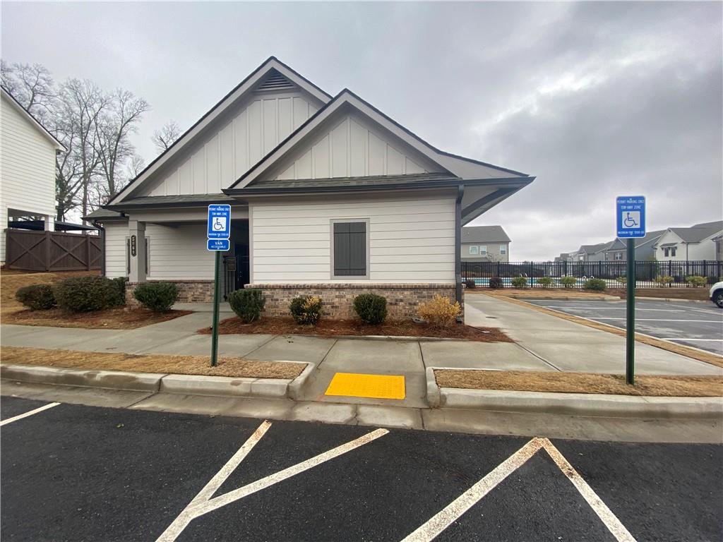 5149 Fox Den Road Oakwood, GA 30566 - Photo 41 of 44 a view of a house with pool and chairs