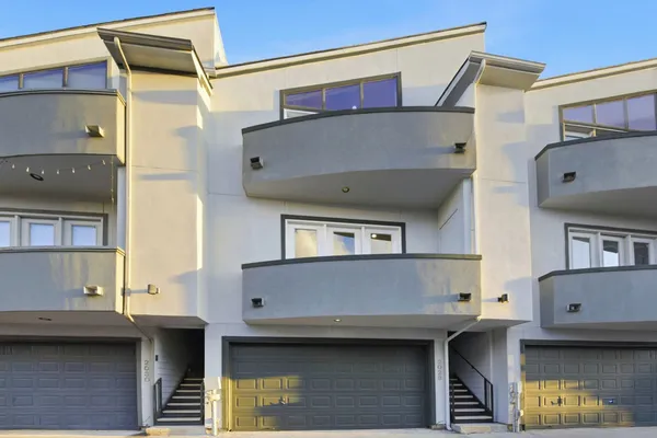 a view of a car park in front of house