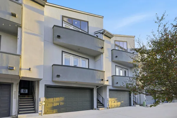 a view of a building with a street