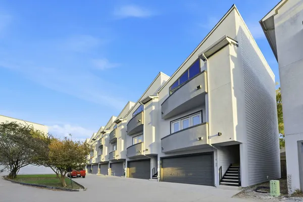 a view of a house with a street