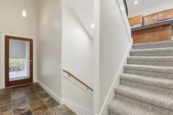 a view of an entryway with staircase