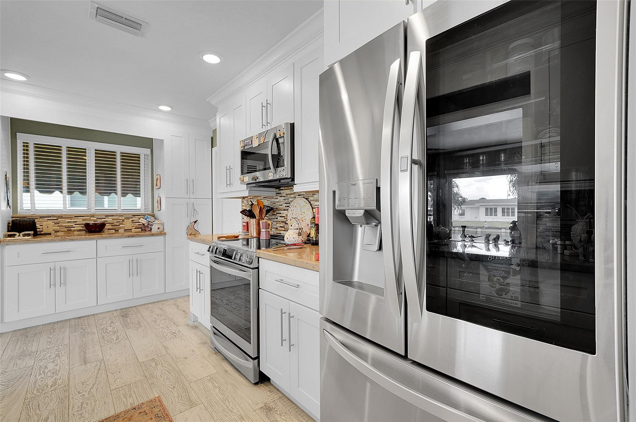 4600 Northwest 45th Street Tamarac, FL 33319 - Photo 9 of 15 Smart refrigerator with 2 ice makers.