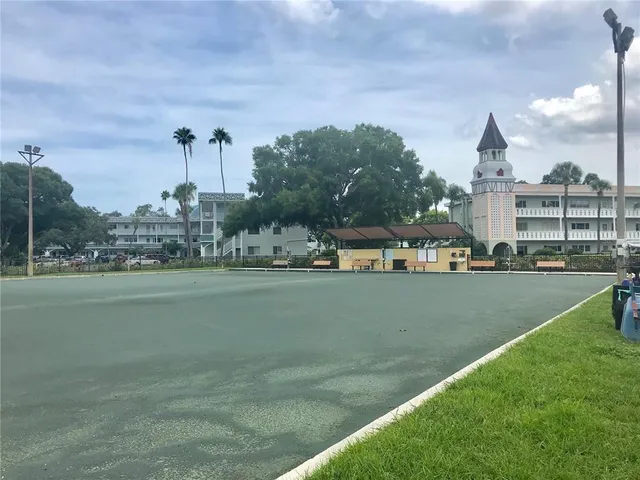 a view of a fountain in front of lake