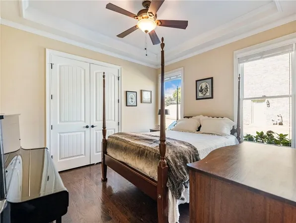 a spacious bathroom with a granite countertop tub sink and mirror
