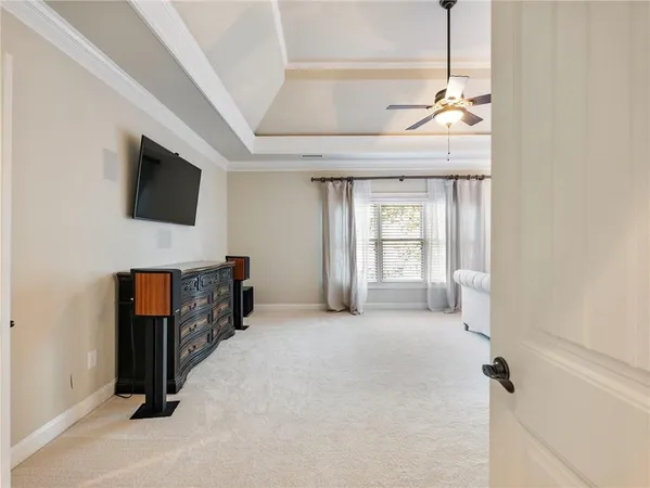 a bed room with a bed and a lamp