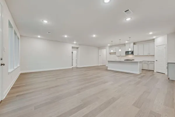 a view of kitchen with wooden floor