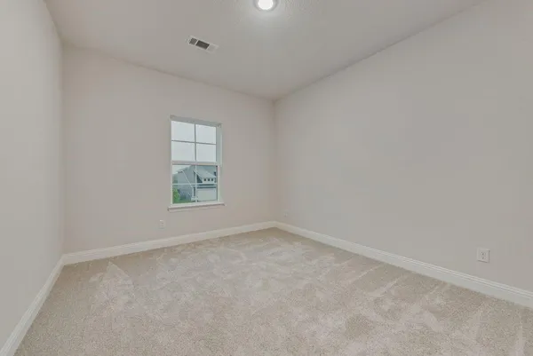 an empty room with window