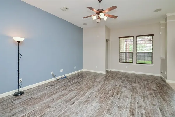 a view of an empty room with a window