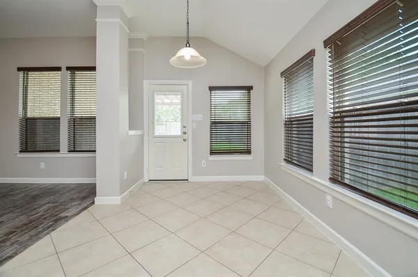 an empty room with windows