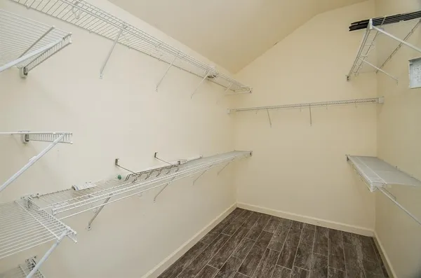 a view of a room with racks on the wall