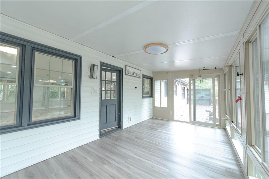 2702 Davenport Road Northwest Duluth, GA 30096 - Photo 15 of 32 a view of an entryway with wooden floor and windows