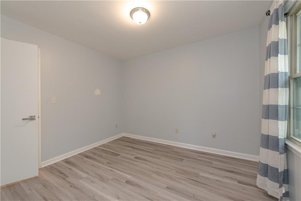 2702 Davenport Road Northwest Duluth, GA 30096 - Photo 19 of 32 wooden floor in an empty room