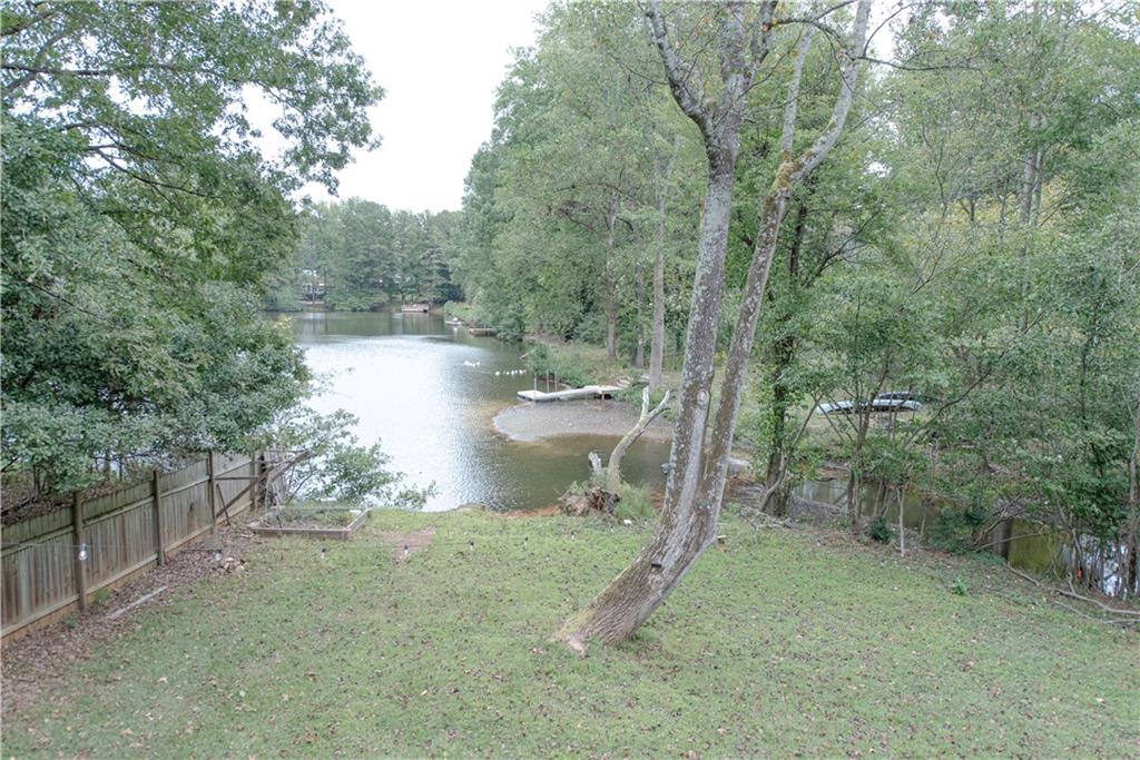2702 Davenport Road Northwest Duluth, GA 30096 - Photo 31 of 32 a backyard of a house with lots of green space
