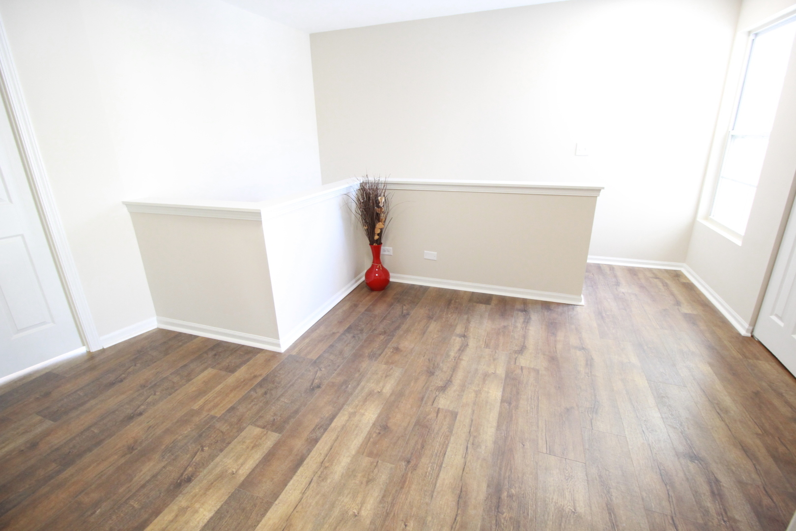 1947 Crestview Circle Romeoville, IL 60446 - Photo 15 of 28 an empty room with wooden floor