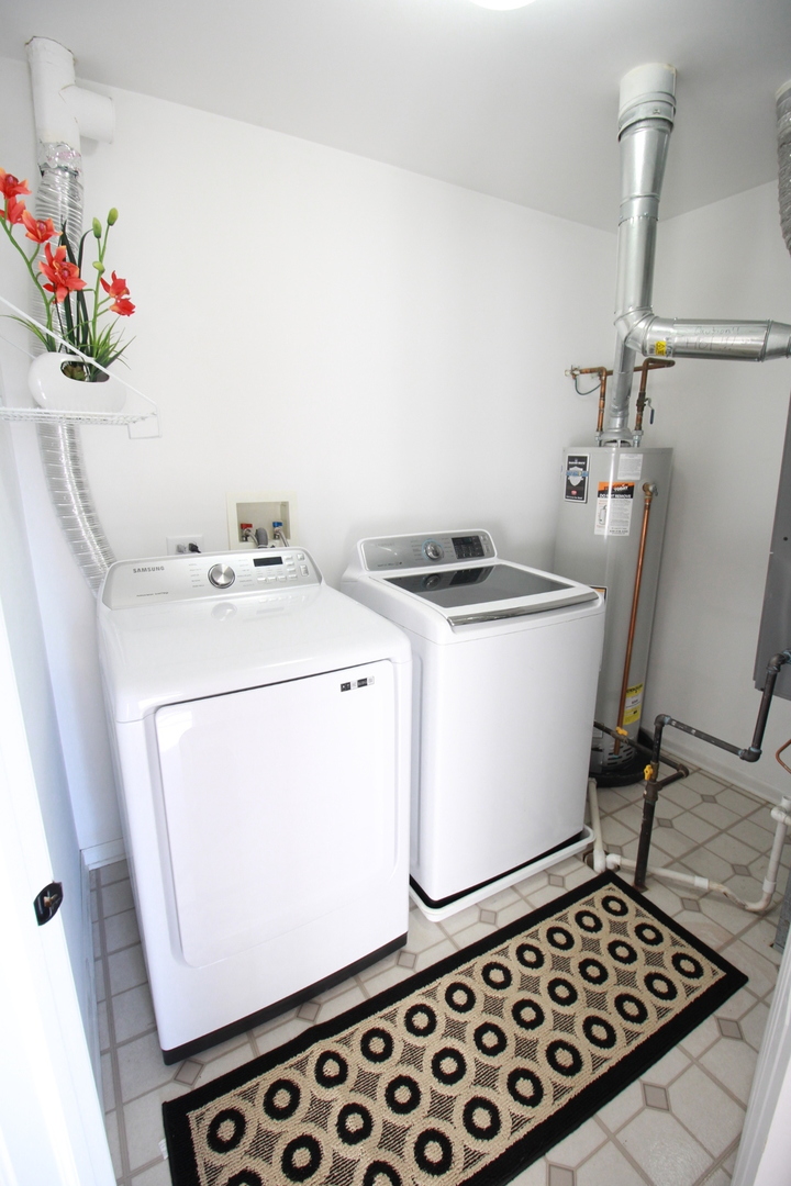 1947 Crestview Circle Romeoville, IL 60446 - Photo 25 of 28 a utility room with dryer and washer