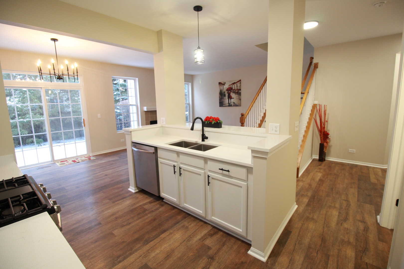 1947 Crestview Circle Romeoville, IL 60446 - Photo 3 of 28 a kitchen with sink cabinets and wooden floor