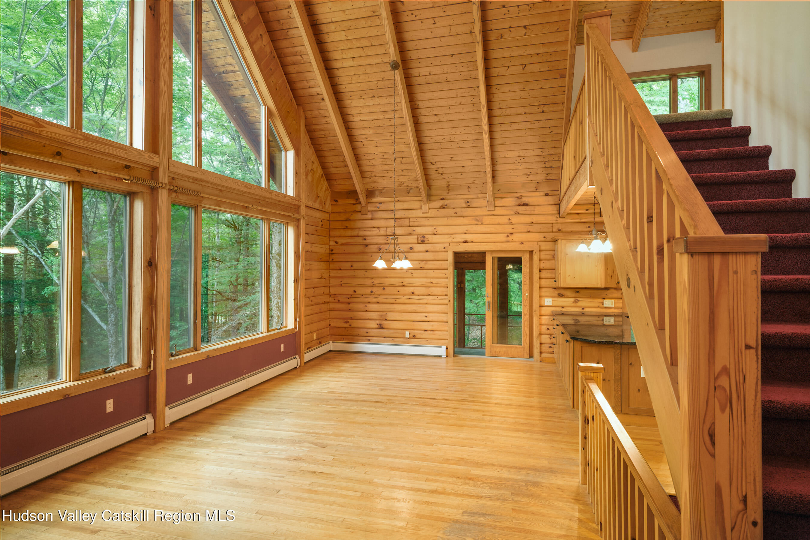 135 Sparrowhawk Lake Road Schenevus, NY 12155 - Photo 13 of 71 012 - Wall of Glass Greatroom - 135 Spar