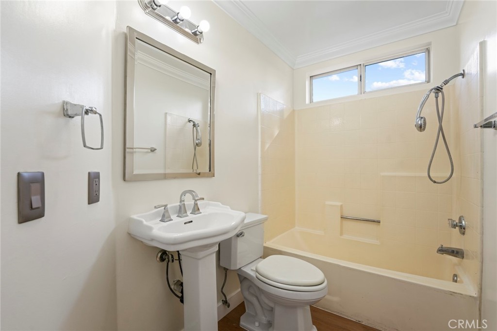 2405 Highland Pines Road Pomona, CA 91767 - Photo 19 of 32 a bathroom with a sink toilet and shower