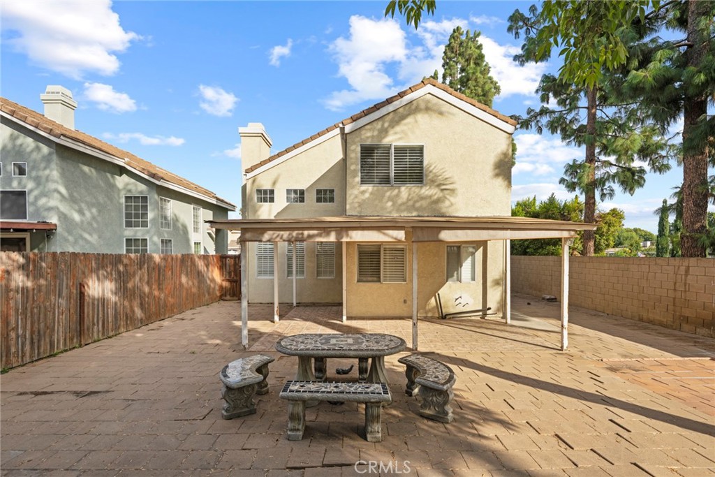 2405 Highland Pines Road Pomona, CA 91767 - Photo 28 of 32 a front view of a house with a yard