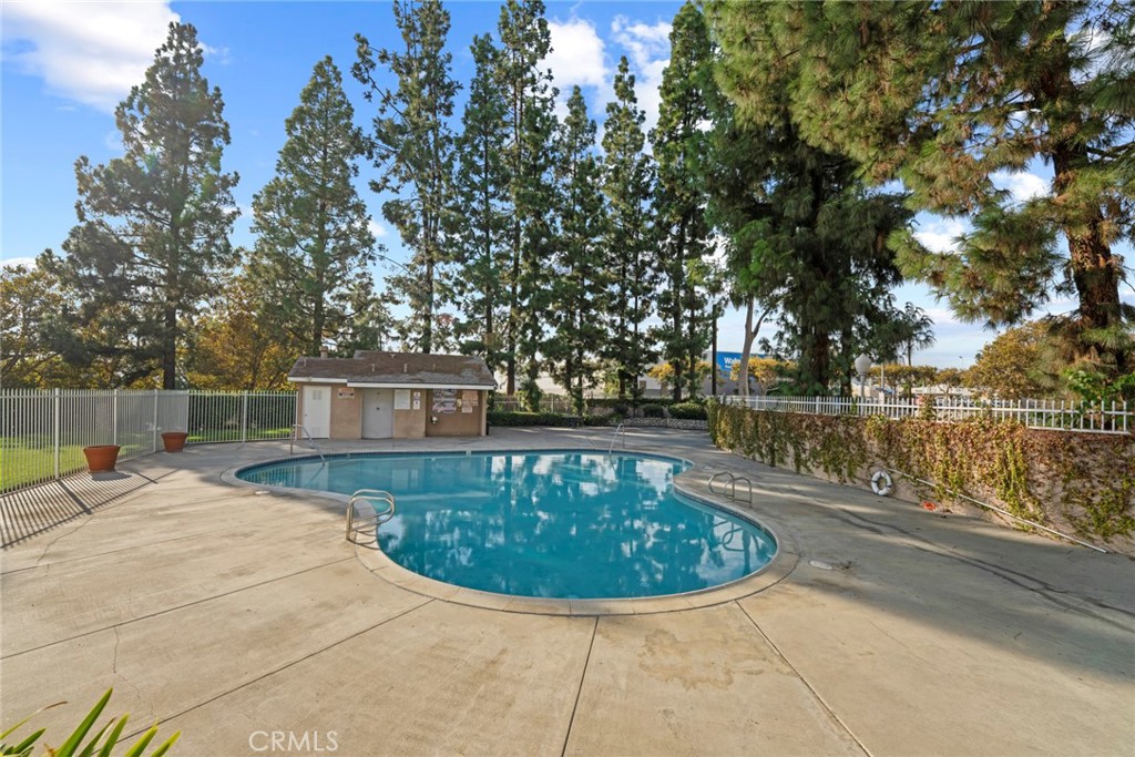 2405 Highland Pines Road Pomona, CA 91767 - Photo 32 of 32 a view of a swimming pool with an outdoor seating