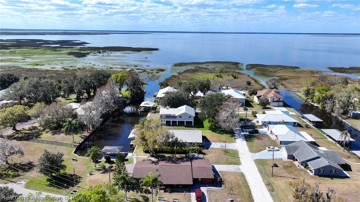 237 Wild Duck Point Lorida, FL 33857 - Photo 15 of 39 a view of swimming pool with outdoor seating and plants