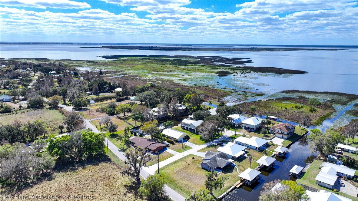 237 Wild Duck Point Lorida, FL 33857 - Photo 3 of 39 a view of a city with an ocean