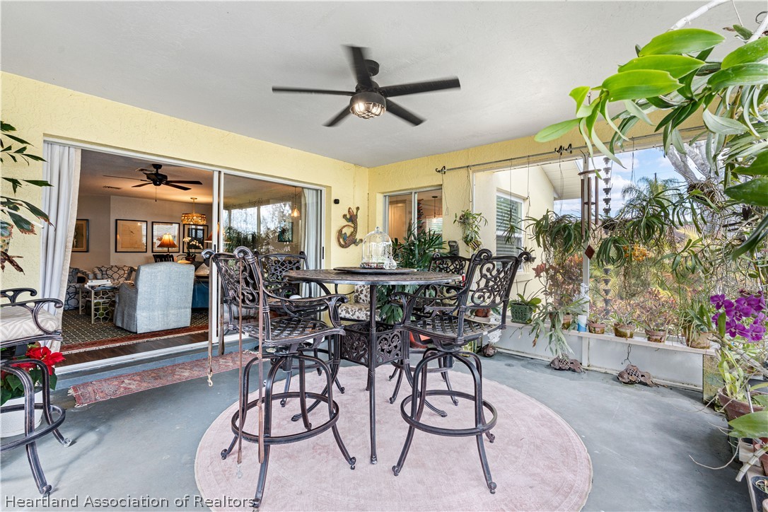 237 Wild Duck Point Lorida, FL 33857 - Photo 38 of 39 a view of a livingroom and a dining room with furniture window and outside view
