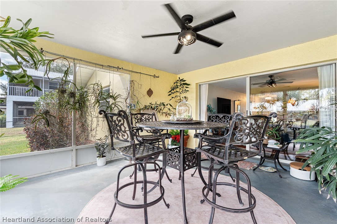 237 Wild Duck Point Lorida, FL 33857 - Photo 39 of 39 a view of a livingroom with furniture and a potted plant