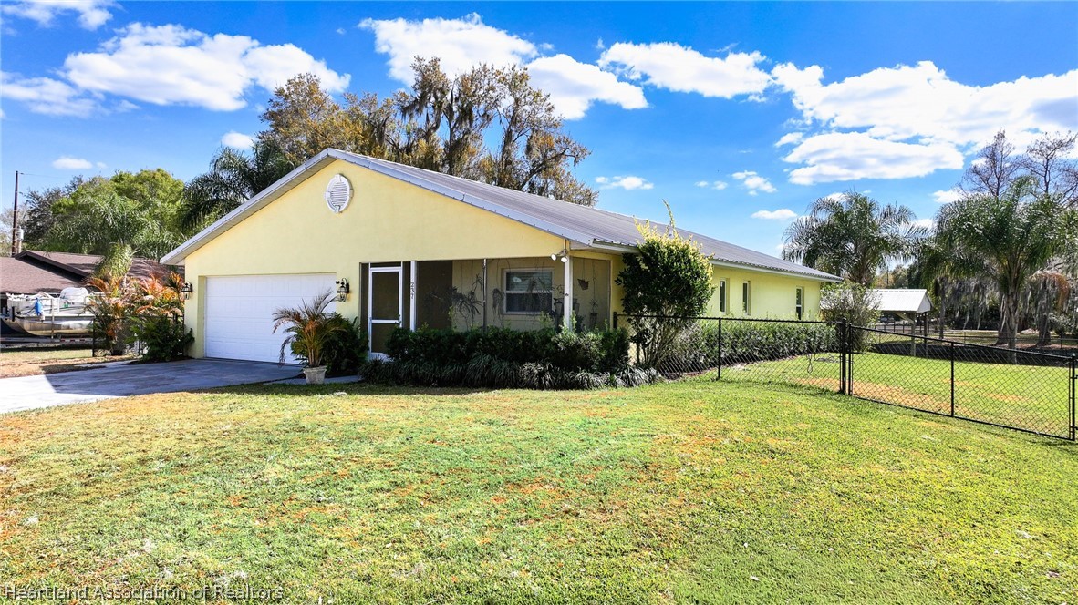 237 Wild Duck Point Lorida, FL 33857 - Photo 5 of 39 a view of a house with a yard and tree s