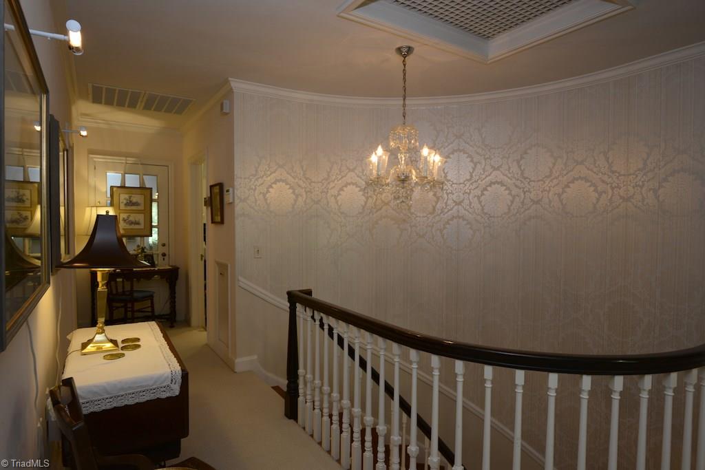 1050 Rockford Road High Point, NC 27262 - Photo 16 of 30 Upstairs view of curved staircase