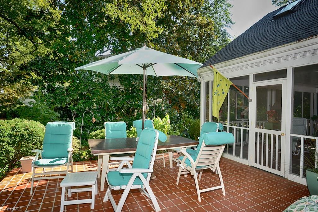1050 Rockford Road High Point, NC 27262 - Photo 25 of 30 Tile patio just off of screened porch