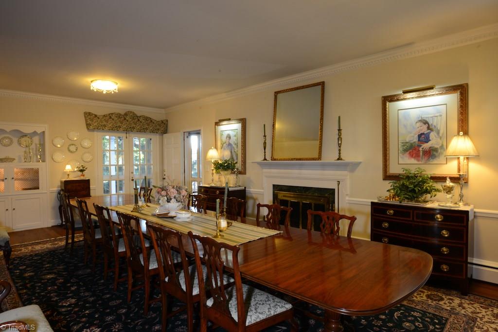 1050 Rockford Road High Point, NC 27262 - Photo 6 of 30 Enormous dining room was originally formal living room. Opens onto patio and screened porch.