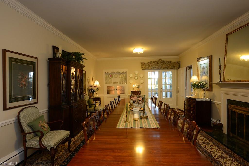 1050 Rockford Road High Point, NC 27262 - Photo 8 of 30 Plenty of room for everyone to dine by the fireplace...one of 4 fireplaces.