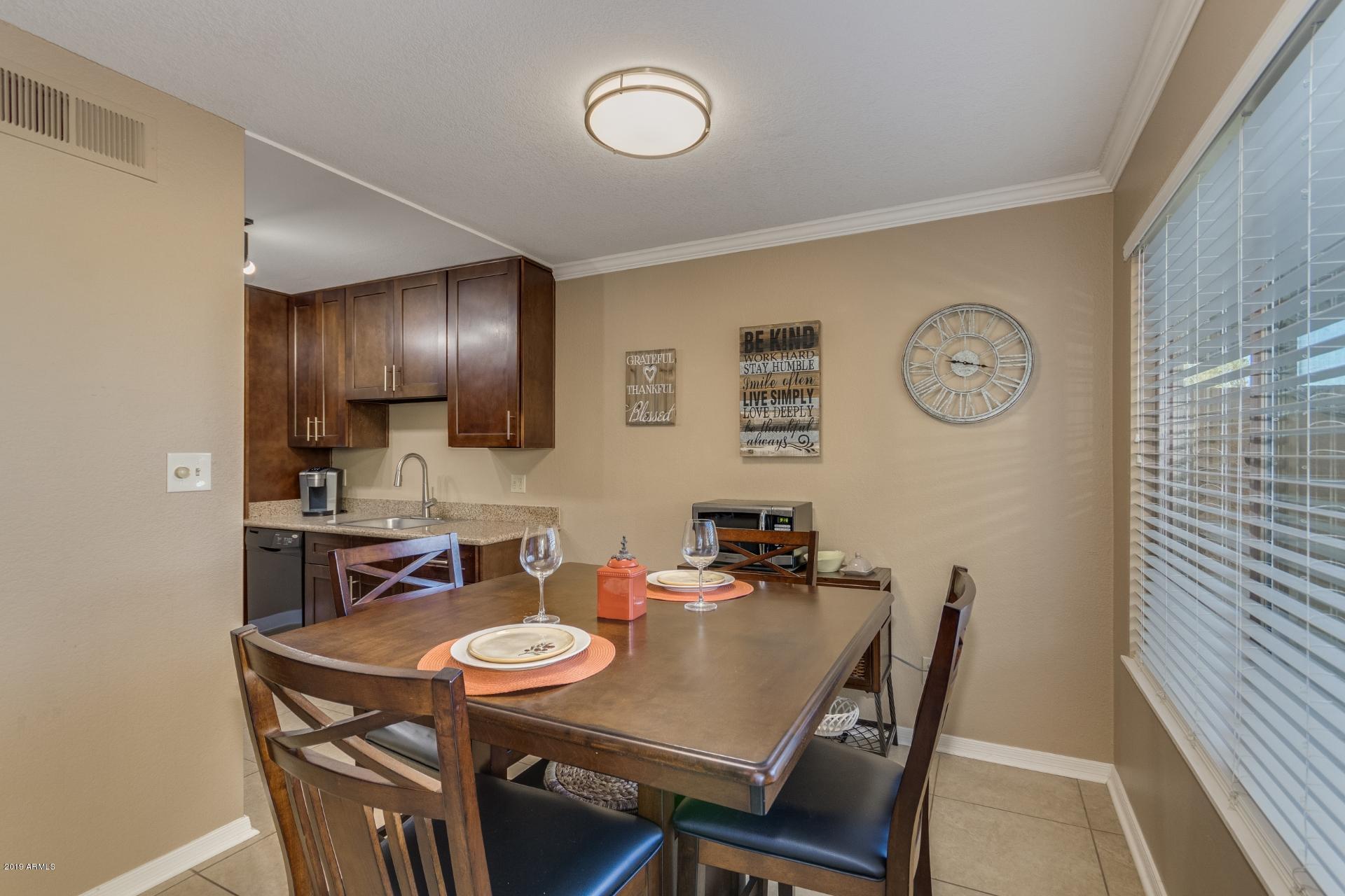 3600 North Hayden Road, Unit 2803 Scottsdale, AZ 85251 - Photo 5 of 22 a view of a dining room with furniture