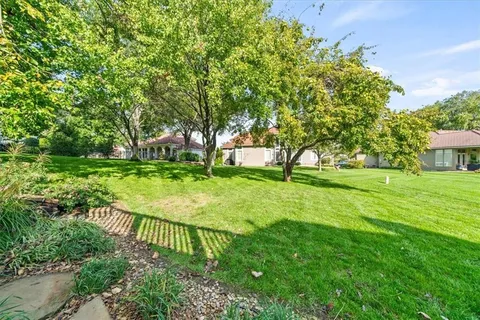 $749,000 | 708 Northeast Lake Point Drive, Lee's Summit, MO 64064