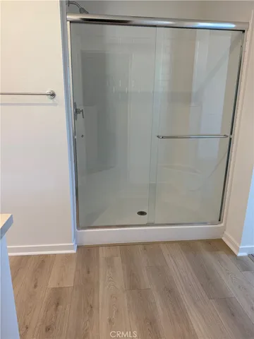 a room with a sink and a mirror