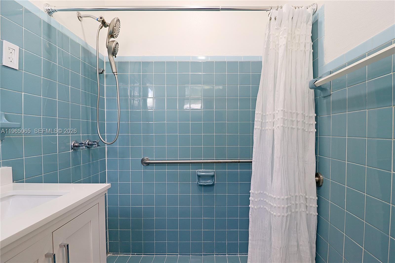 3330 Southwest 2nd Street Miami, FL 33135 - Photo 18 of 28 a bathroom with a shower