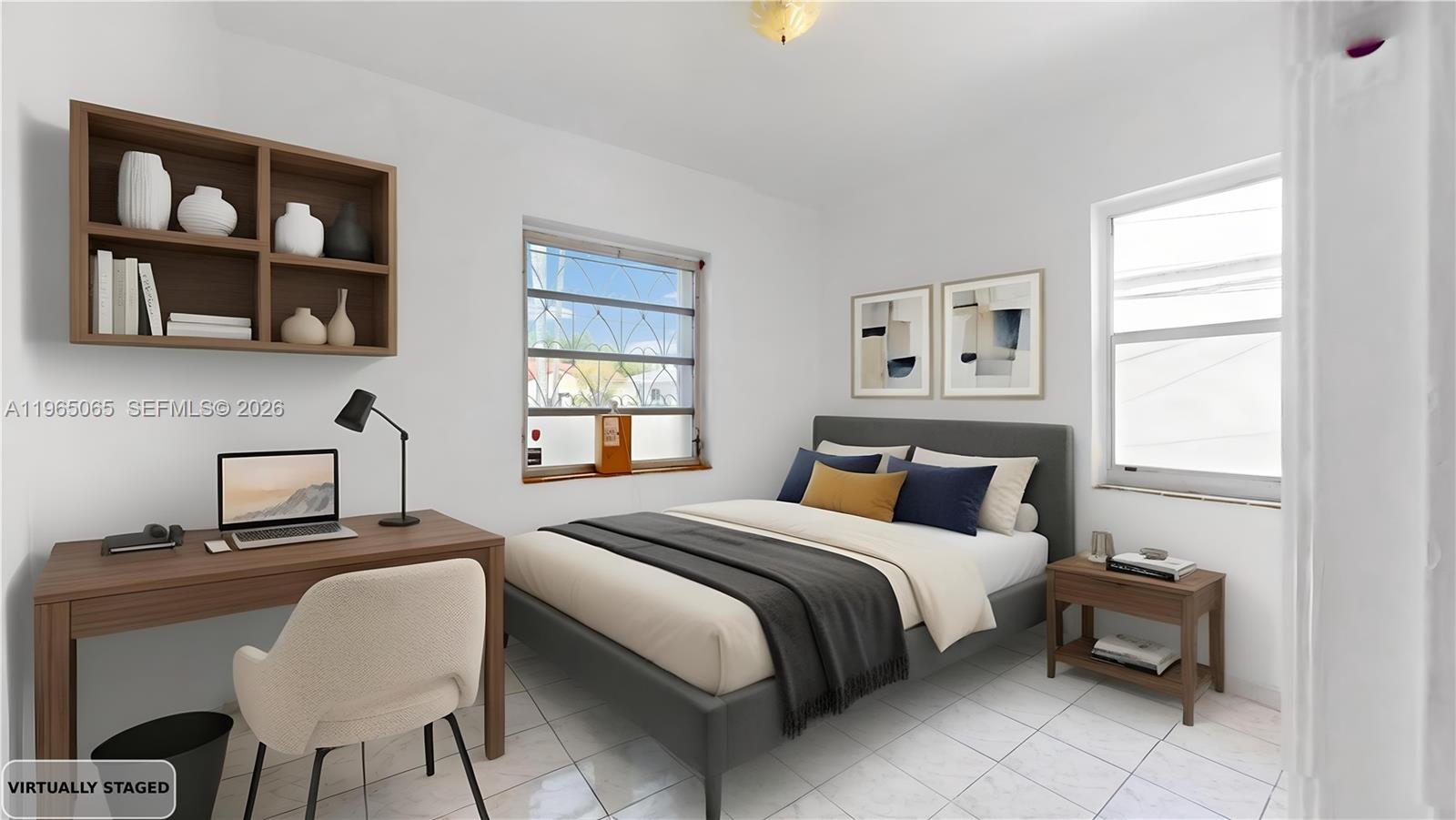 3330 Southwest 2nd Street Miami, FL 33135 - Photo 19 of 28 a bedroom with a bed and a chair