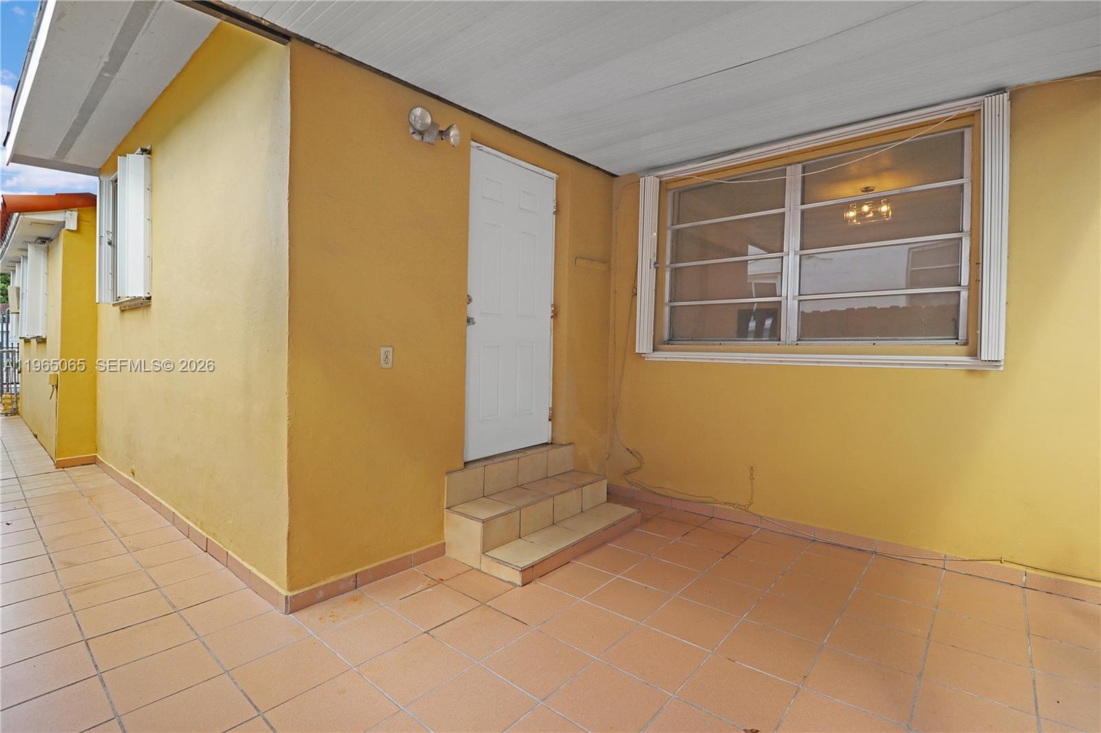 3330 Southwest 2nd Street Miami, FL 33135 - Photo 24 of 28 a view of an empty room with a window