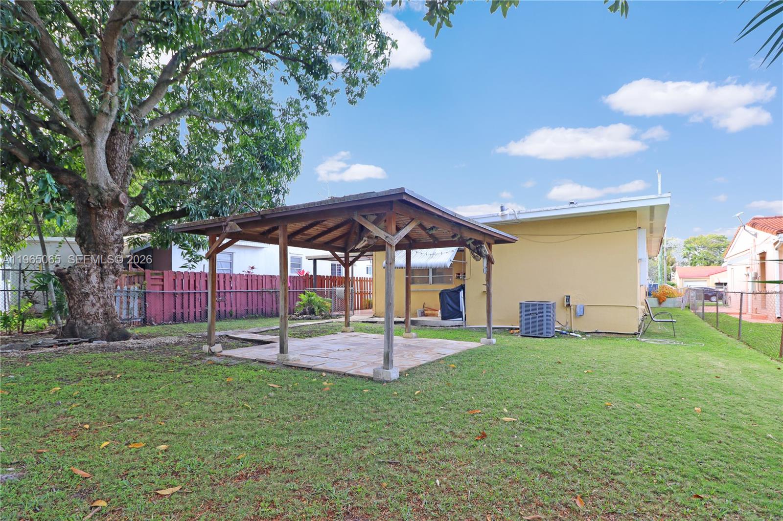 3330 Southwest 2nd Street Miami, FL 33135 - Photo 27 of 28 a view of a house with a yard and sitting area