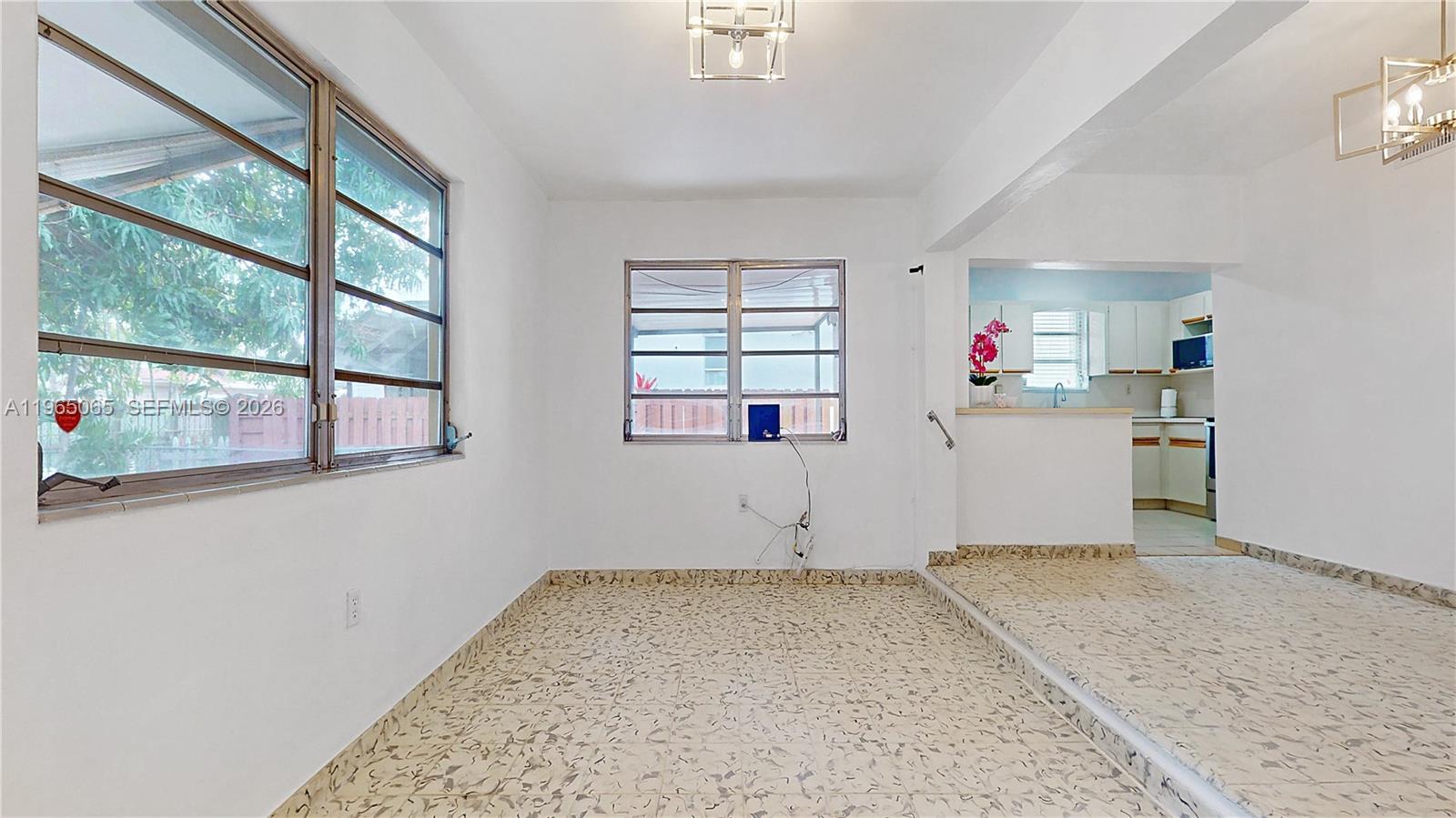 3330 Southwest 2nd Street Miami, FL 33135 - Photo 10 of 28 a room with window and cabinet