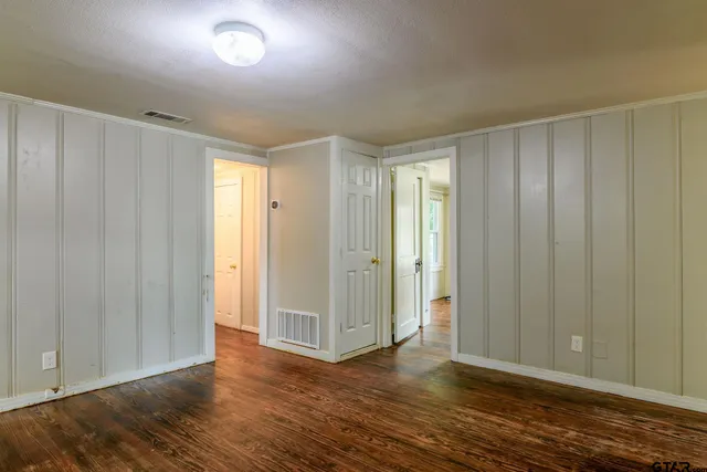 a view of entryway with wooden floor